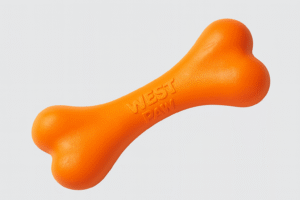hard rubber yellow chew toy for dogs that are tough chewers.